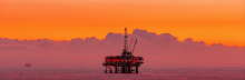 toxic sublime: oil rig and sunset