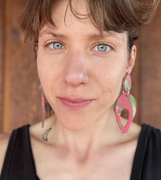 headshot against wooden wall