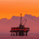 toxic sublime: oil rig and sunset